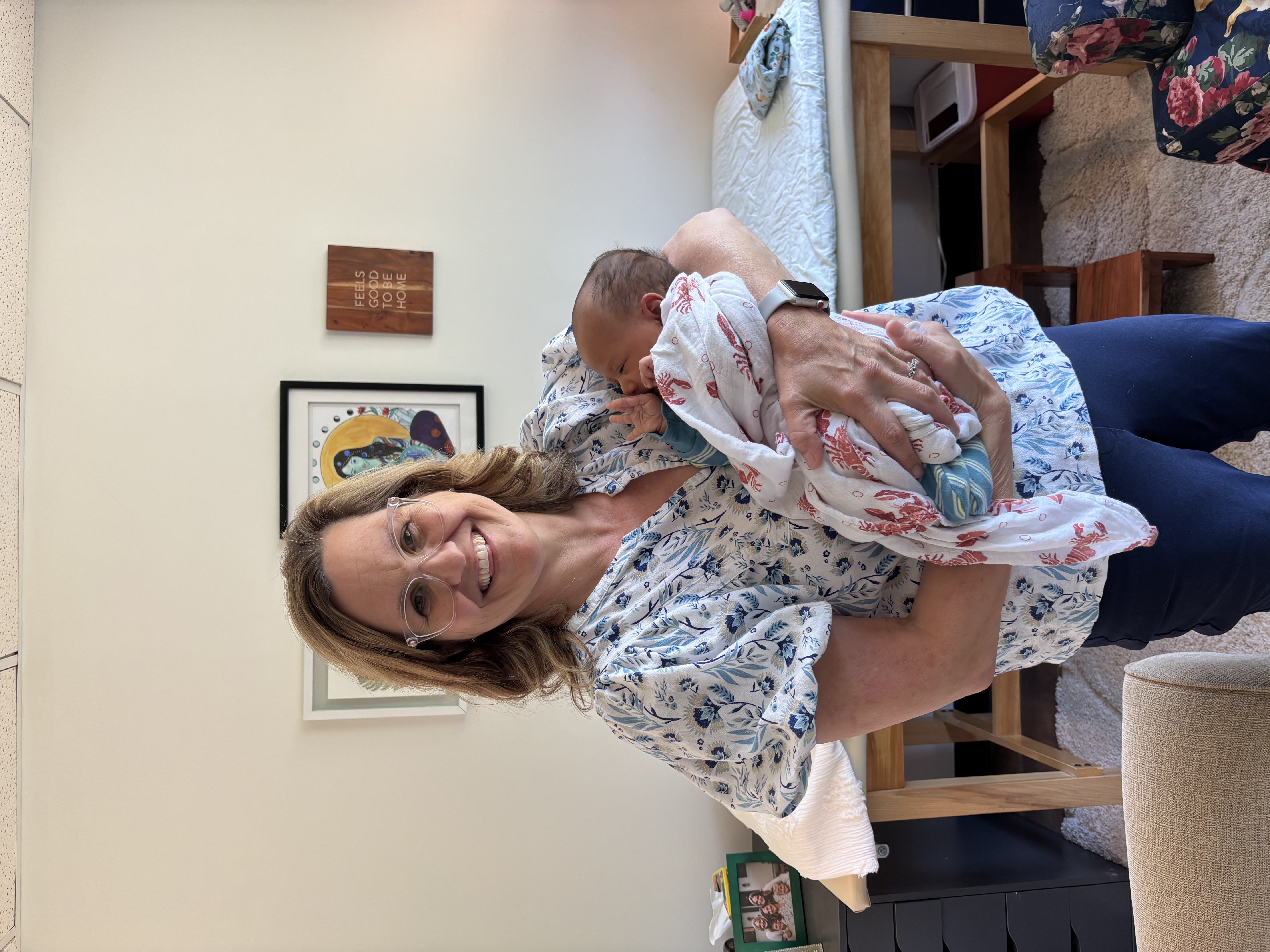A mother and her newborn during postpartum care